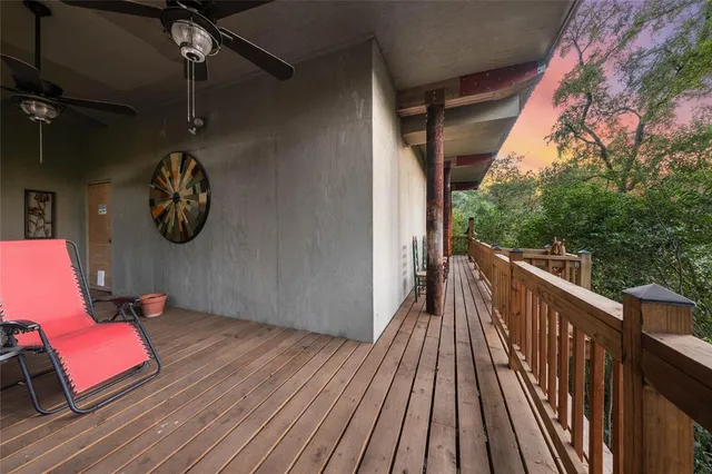 a balcony with wooden floor