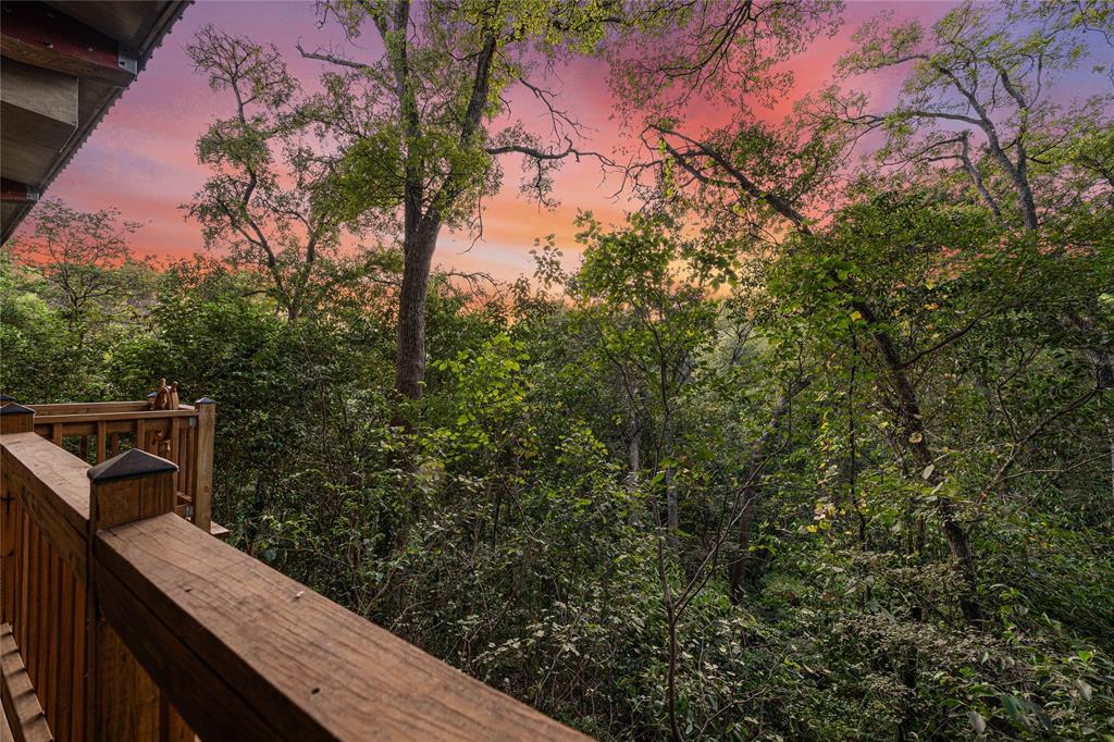 3020 North 43rd Street Waco, TX 76708 - Photo 37 of 40 a view of a balcony with wooden fence and floor