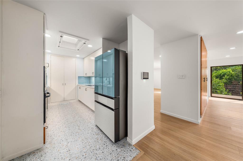 3020 North 43rd Street Waco, TX 76708 - Photo 10 of 40 a view of a bathroom with a glass door shower