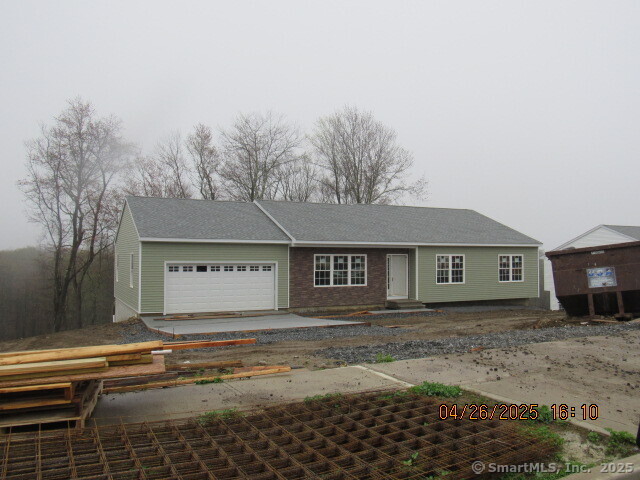 57 Warm Earth Road Naugatuck, CT 06770 - Photo 2 of 10 a house view with a outdoor space
