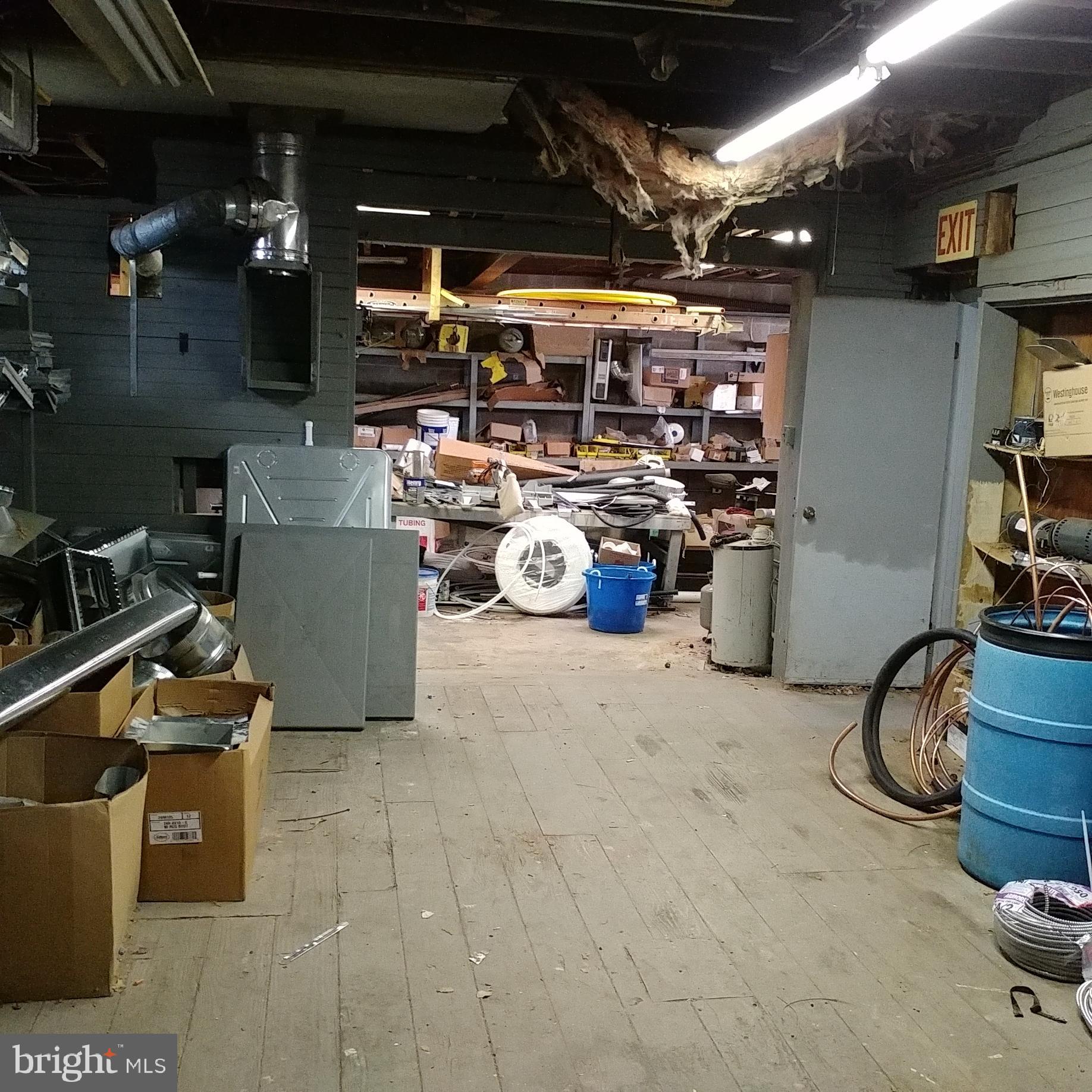 57 East Eagle Road Havertown, PA 19083 - Photo 14 of 19 Storage space behind entry to garages