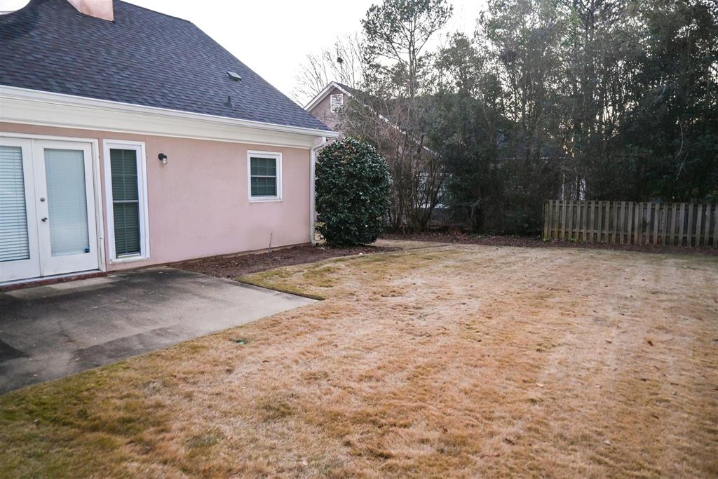 4847 Champion's Way Columbus, GA 31909 - Photo 18 of 39 a view of a backyard of the house