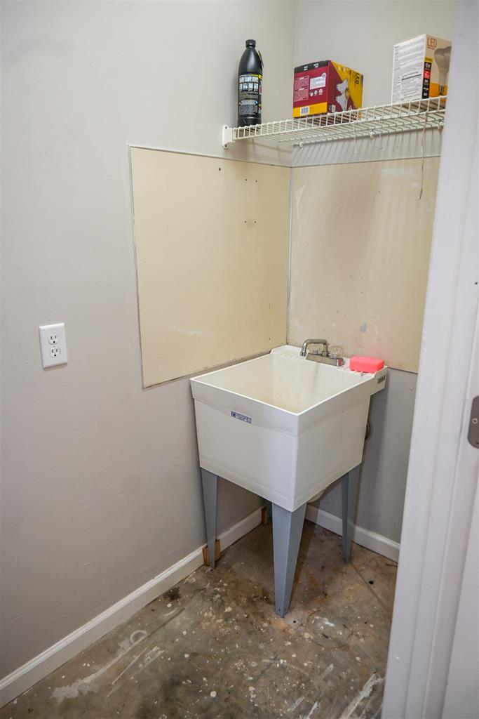 4847 Champion's Way Columbus, GA 31909 - Photo 39 of 39 a bathroom with a sink and a table