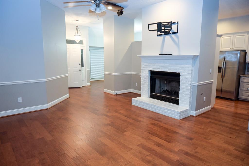 4847 Champion's Way Columbus, GA 31909 - Photo 6 of 39 a view of a livingroom with an empty space and a fireplace