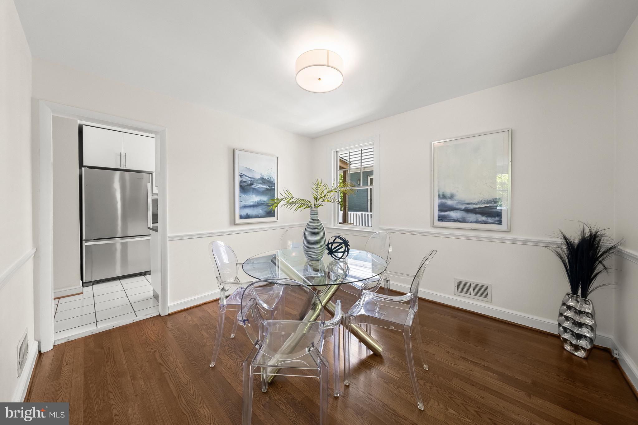 8800 Maywood Avenue Silver Spring, MD 20910 - Photo 12 of 41 a living room with furniture and wooden floor