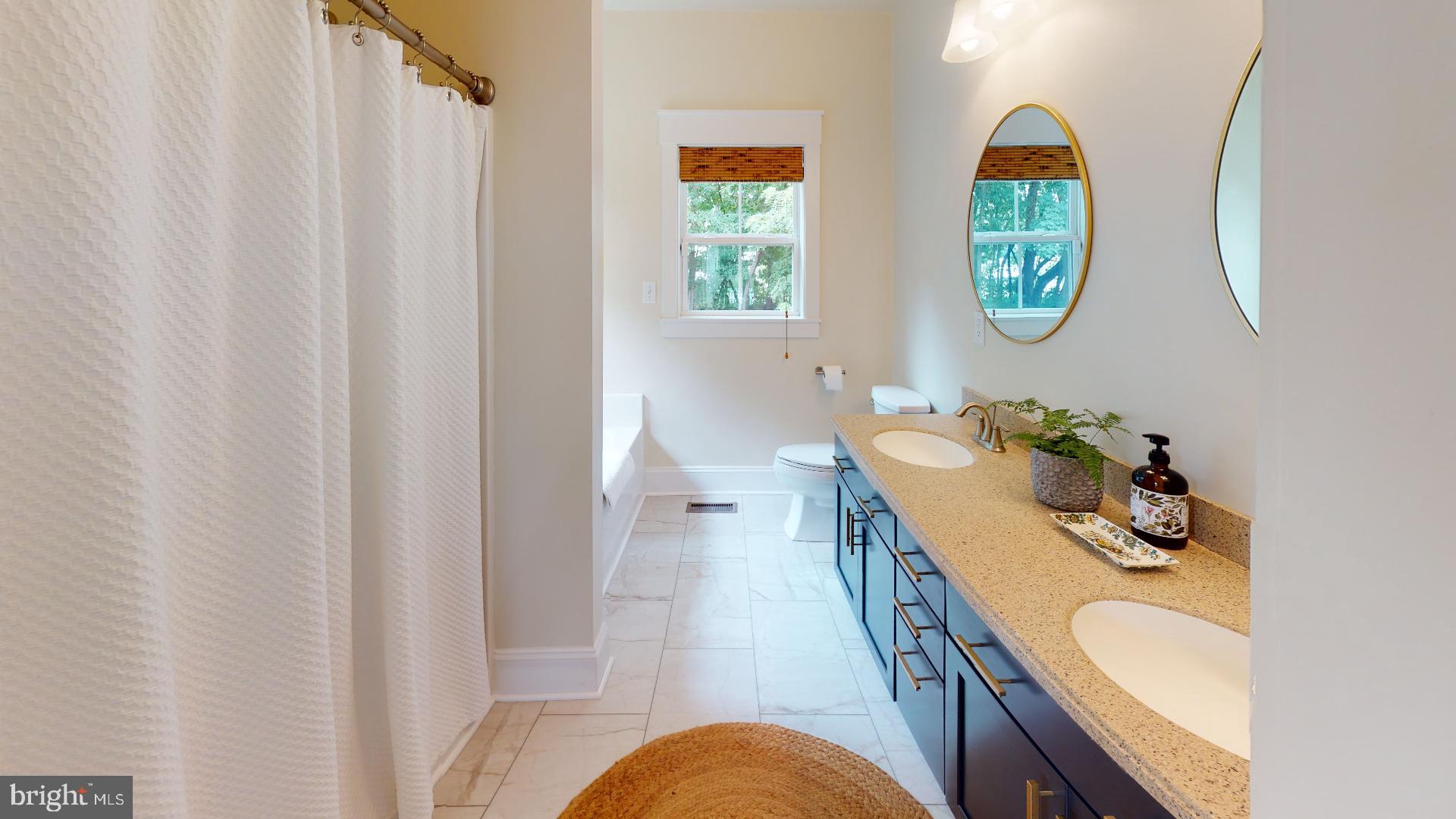 321 Front Street Crumpton, MD 21628 - Photo 14 of 27 Primary bedroom bath with tub, shower& double sink