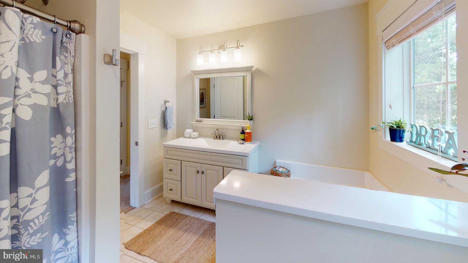 321 Front Street Crumpton, MD 21628 - Photo 17 of 27 Upstairs bathroom w/ tub & shower