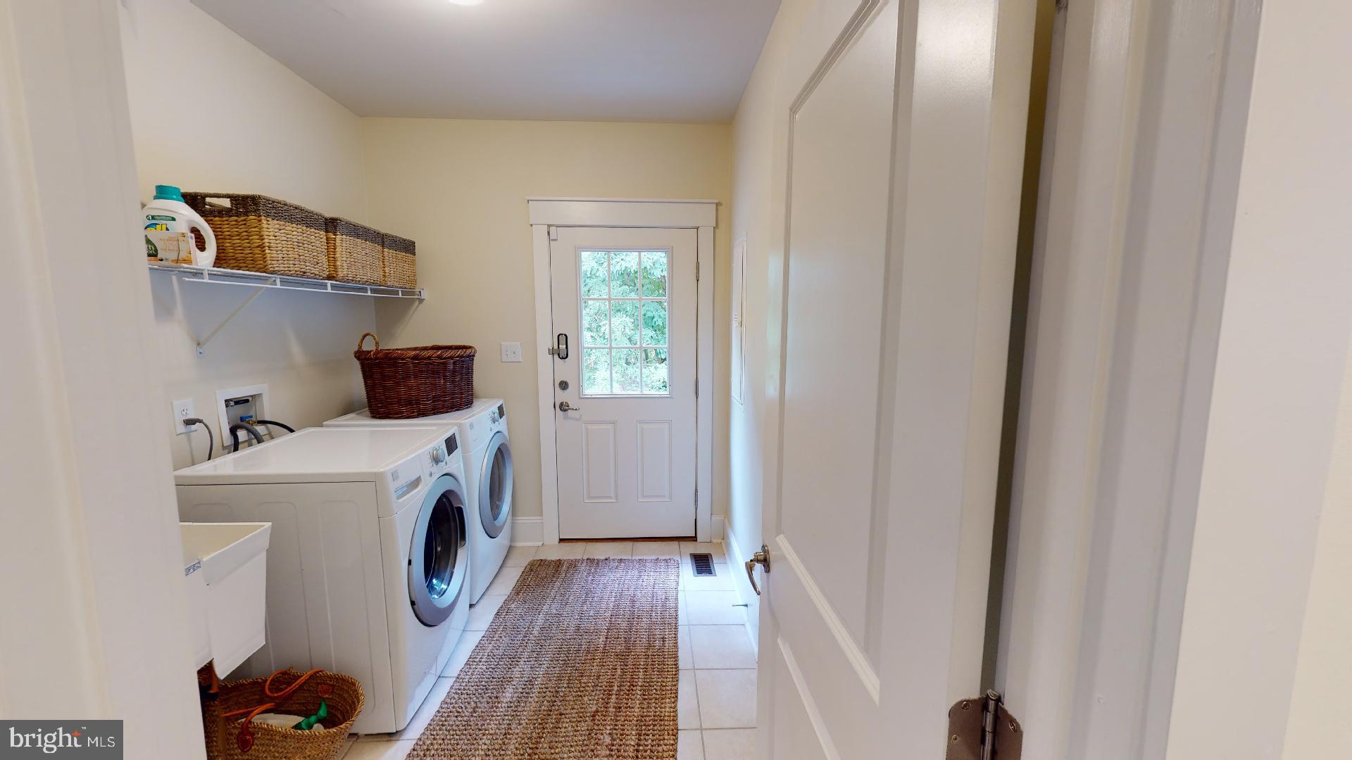 321 Front Street Crumpton, MD 21628 - Photo 10 of 27 Laundry room off main level hall with sink