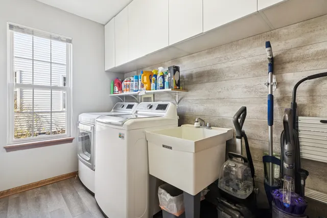 a utility room with dryer and washer