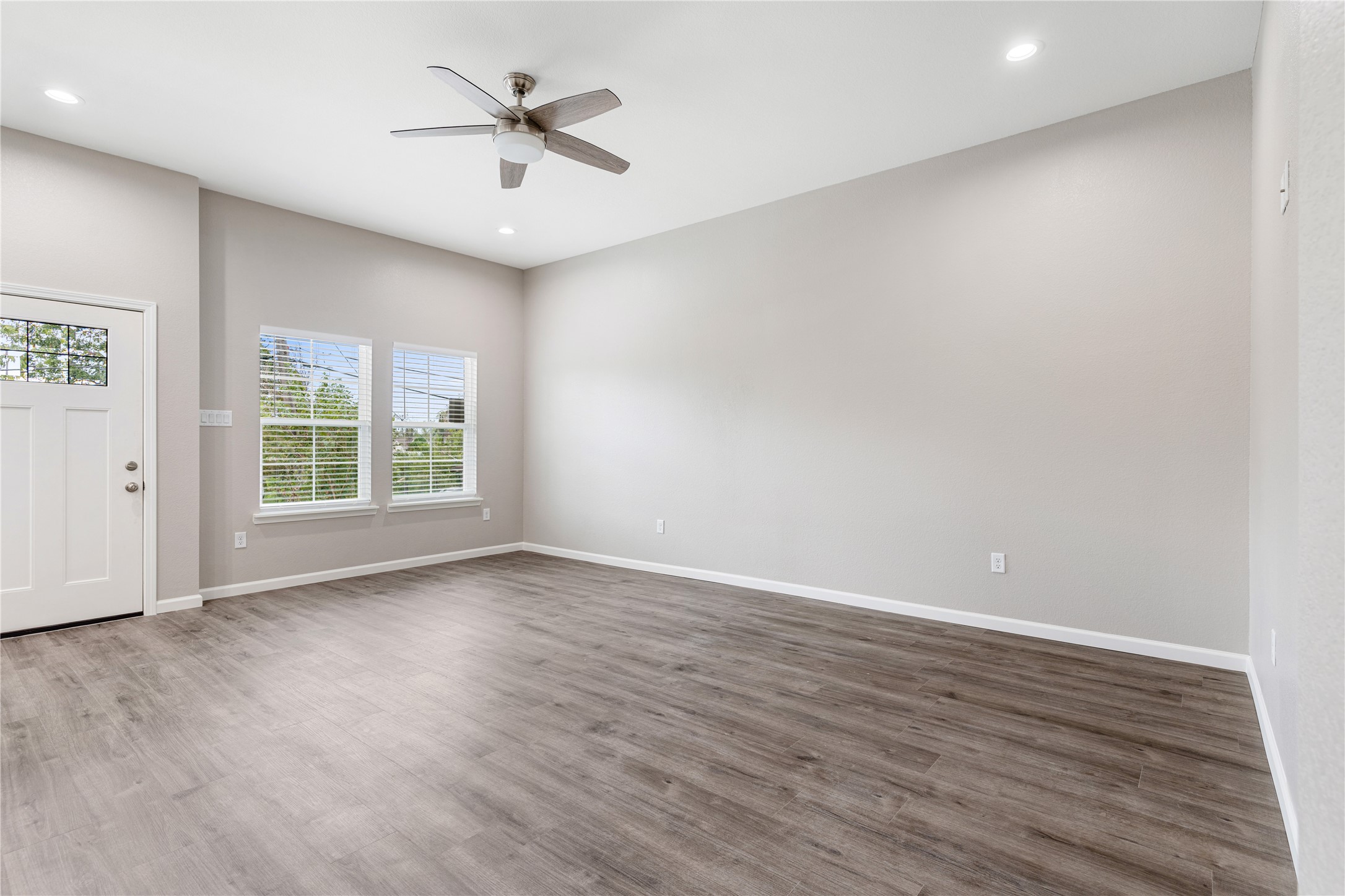 1321 East 35th Street Houston, TX 77022 - Photo 8 of 24 wooden floor in an empty room with a window