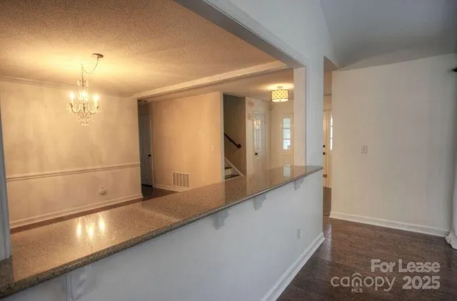 a view of a hallway with entryway