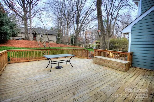 a view of a patio with a table and chairs