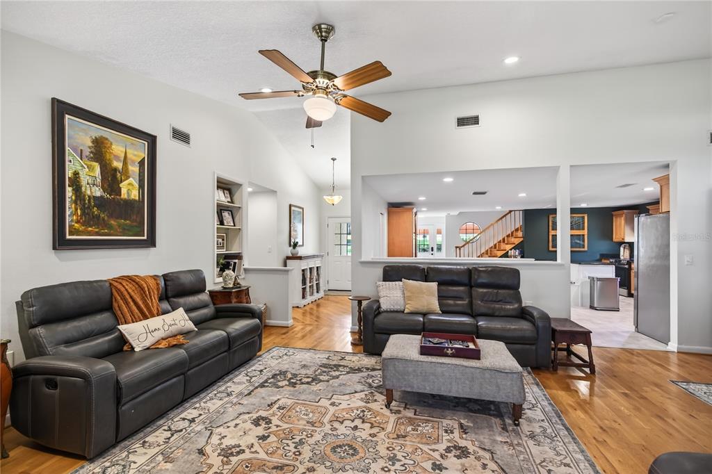 17025 Peru Road Umatilla, FL 32784 - Photo 15 of 73 a living room with furniture and a wooden floor