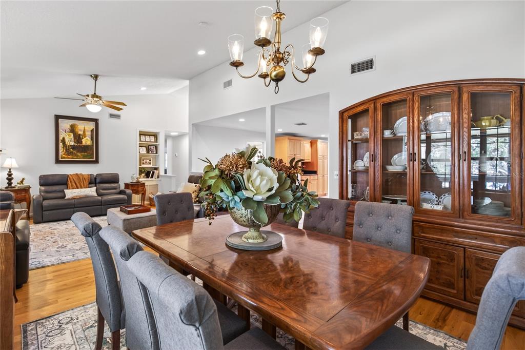 17025 Peru Road Umatilla, FL 32784 - Photo 17 of 73 a view of a dining room with furniture window and wooden floor