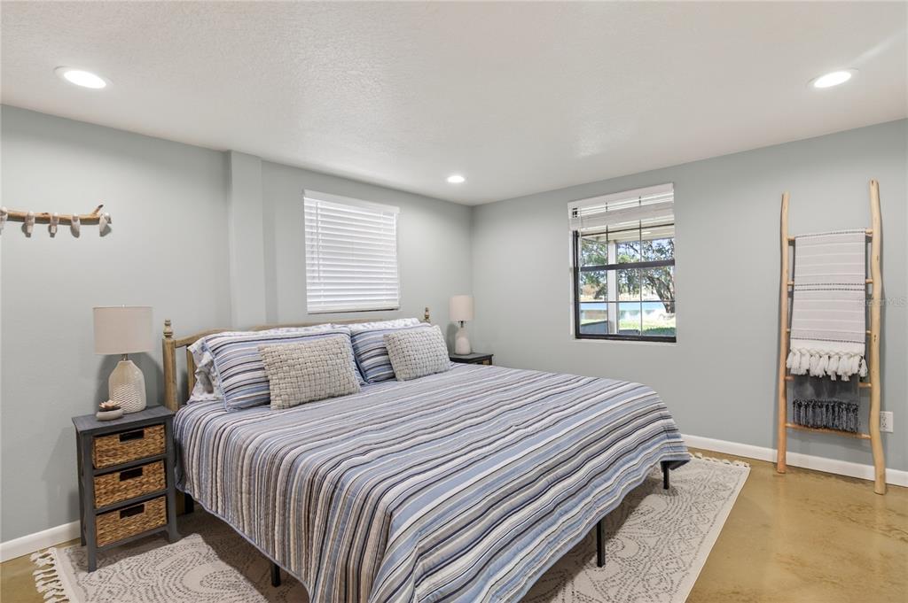 17025 Peru Road Umatilla, FL 32784 - Photo 53 of 73 a bedroom with a bed and a window