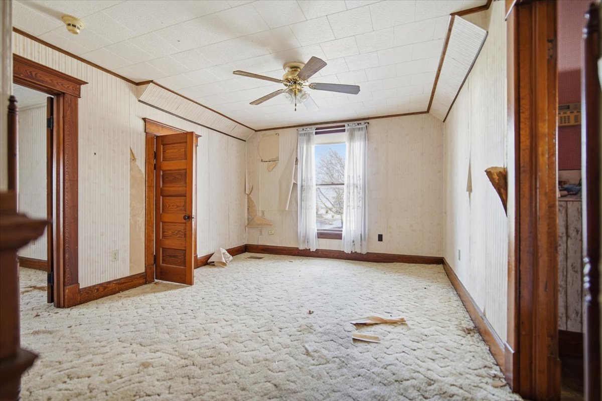 410 North Main Street Le Roy, IL 61752 - Photo 11 of 23 an empty room with windows and closet