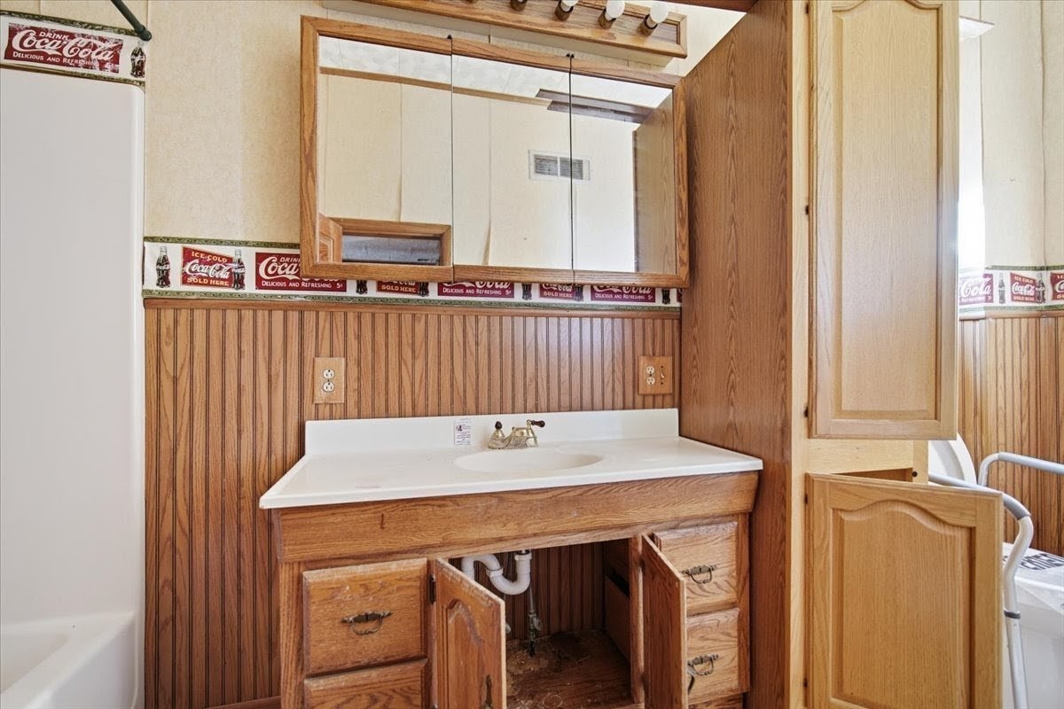 410 North Main Street Le Roy, IL 61752 - Photo 6 of 23 a view of a kitchen with a table and chairs