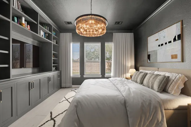 a spacious bedroom with a large bed and a large window