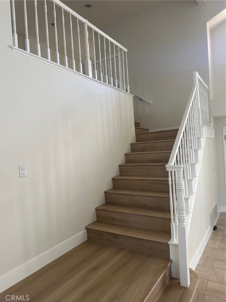 28451 Fieldbrook Mission Viejo, CA 92692 - Photo 18 of 43 a view of entryway with wooden floor