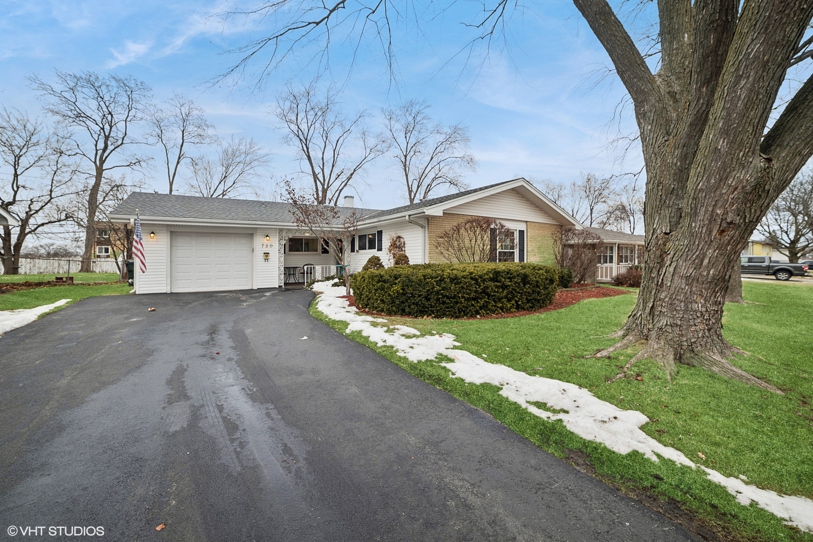 720 Alcoa Lane Hoffman Estates, IL 60169 - Photo 1 of 23 a front view of a house with a yard and garage