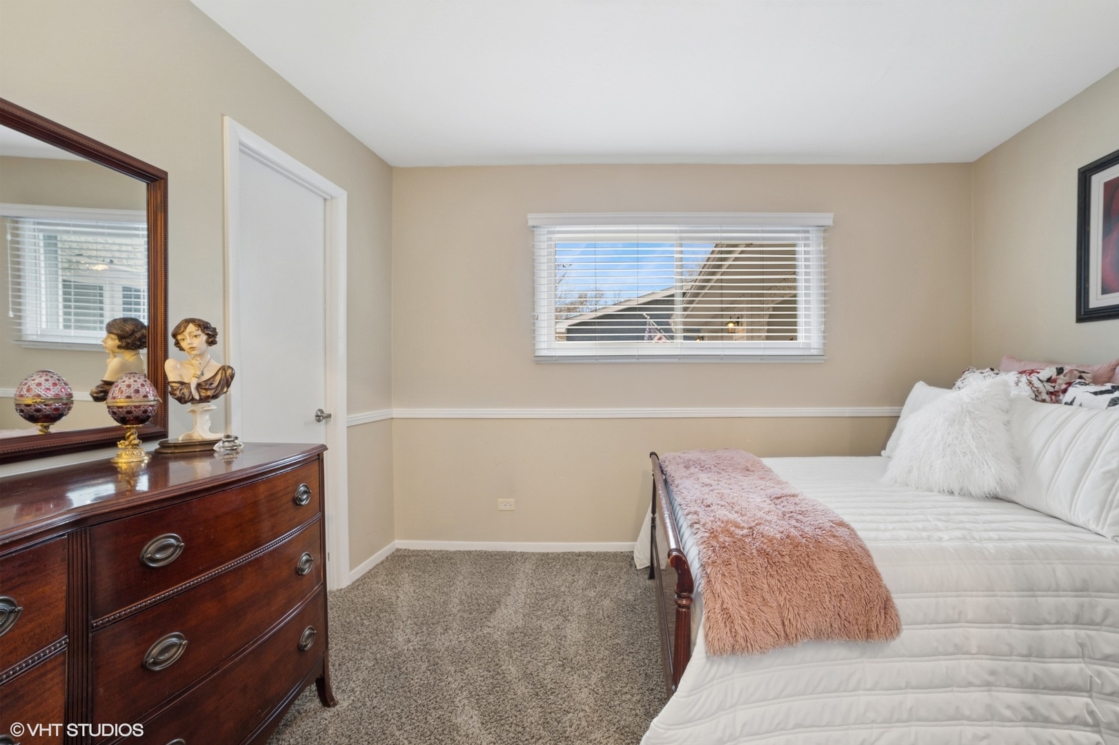 720 Alcoa Lane Hoffman Estates, IL 60169 - Photo 11 of 23 a bedroom with a bed and a dresser
