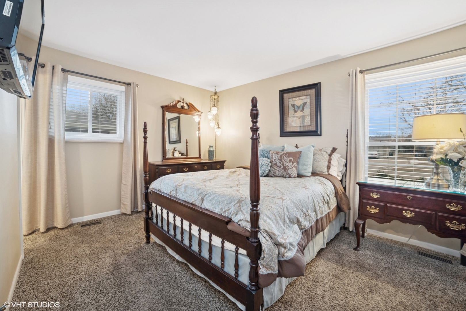 720 Alcoa Lane Hoffman Estates, IL 60169 - Photo 13 of 23 a spacious bedroom with a bed and a window