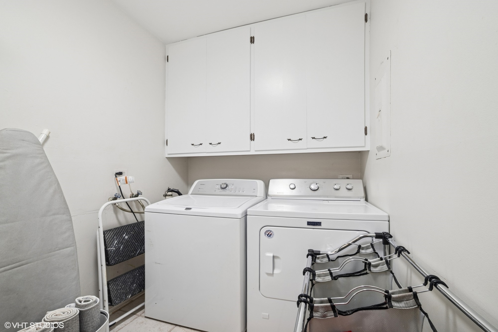 720 Alcoa Lane Hoffman Estates, IL 60169 - Photo 15 of 23 a view of storage and utility room with washer and dryer