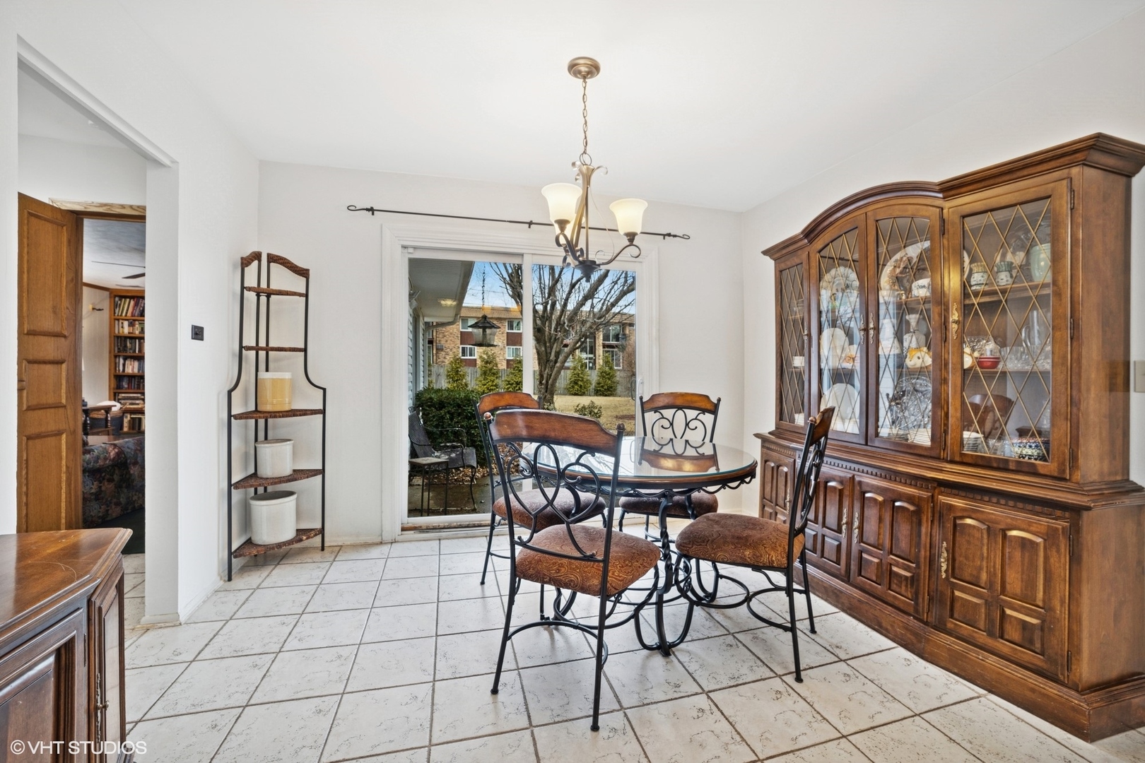 720 Alcoa Lane Hoffman Estates, IL 60169 - Photo 7 of 23 a view of a dining room with furniture window and wooden floor