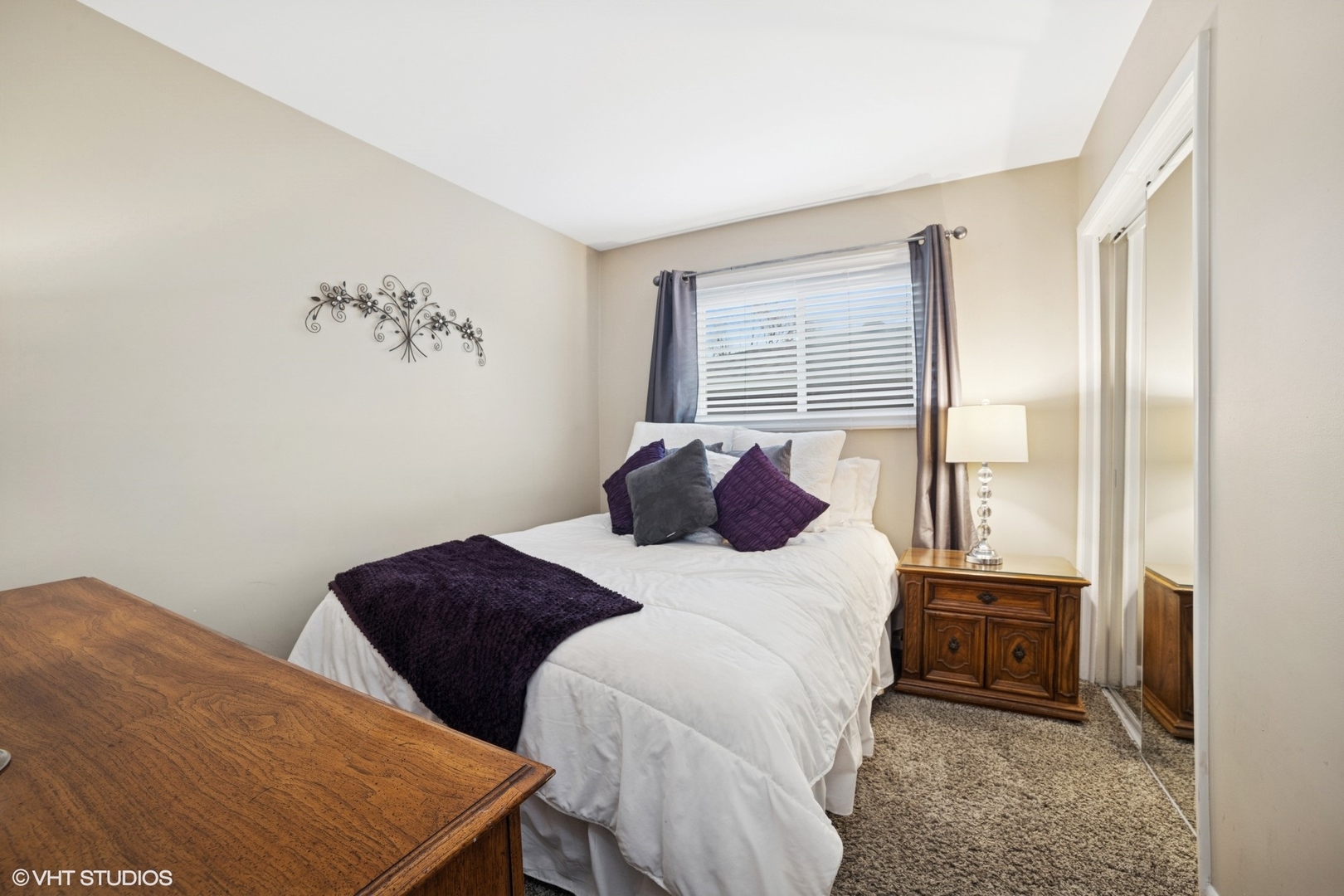 720 Alcoa Lane Hoffman Estates, IL 60169 - Photo 10 of 23 a bedroom with a bed and a painting on the wall