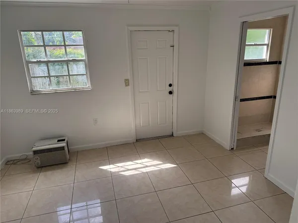 a view of an empty room with a stove