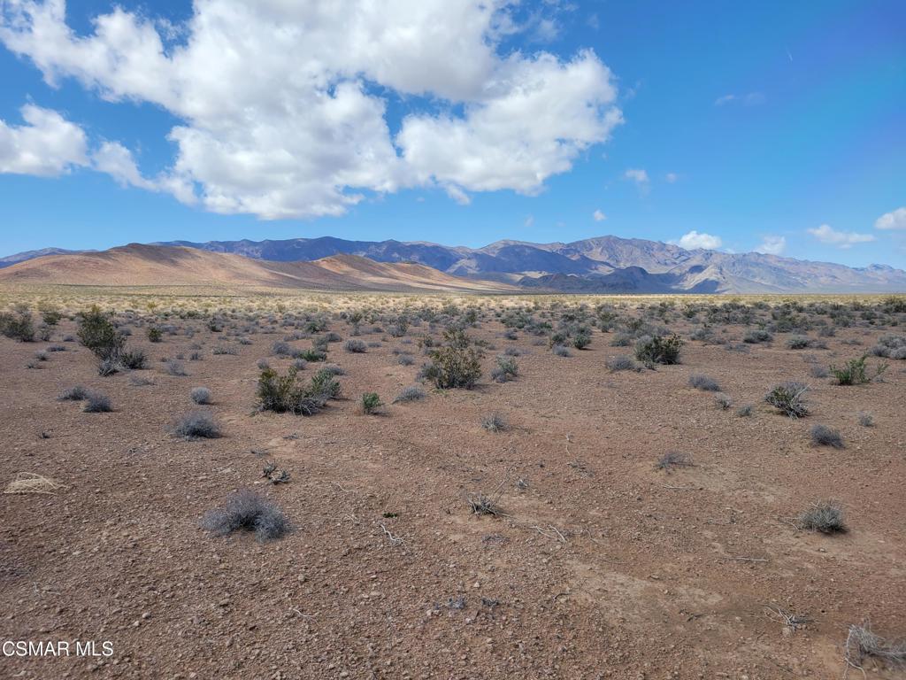 a view of an outdoor space with mountain view