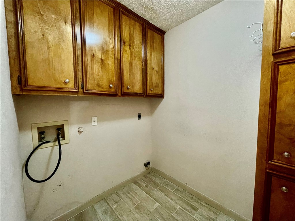 7302 Twilight Ridge Drive Corpus Christi, TX 78413 - Photo 15 of 22 a view of a room with wooden walls and windows