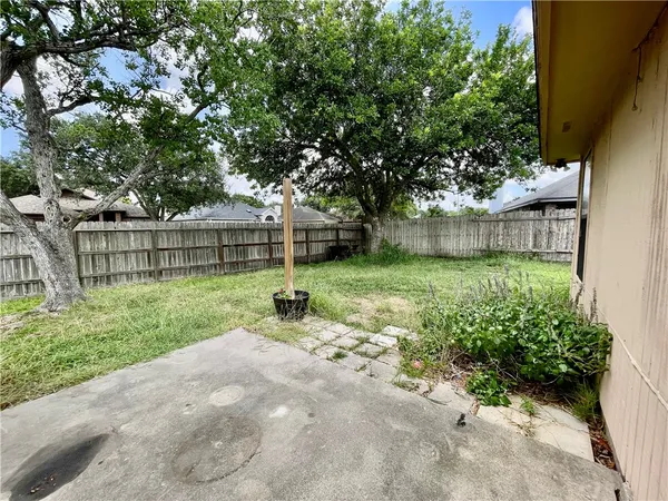 a view of a backyard with a garden