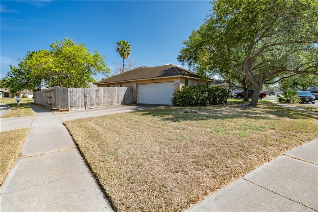 7302 Twilight Ridge Drive Corpus Christi, TX 78413 - Photo 22 of 22 a view of a house with a yard