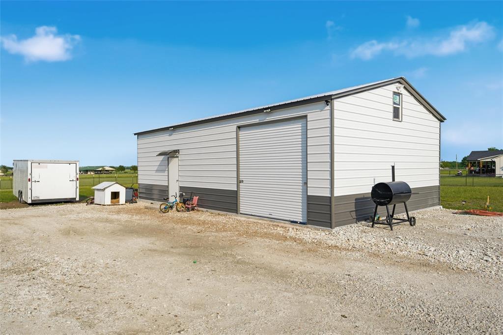 151 Kasberg Road Leroy, TX 76691 - Photo 23 of 40 a view of a house with backyard and sitting area