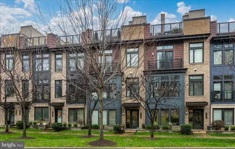 a view of a building with a yard