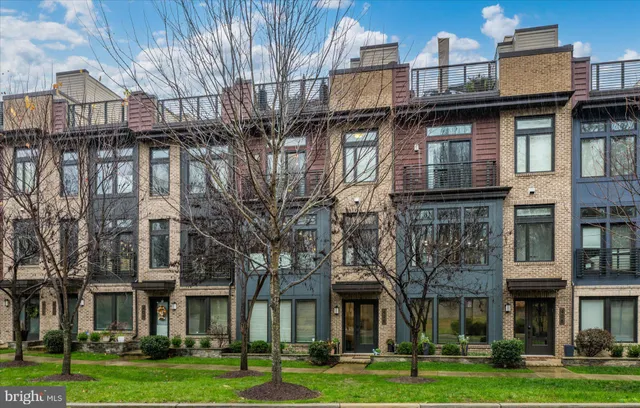 a view of a building with a yard