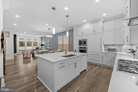 a bathroom with a sink a bath tub and a shower