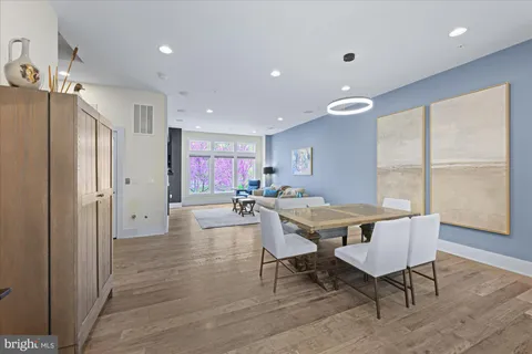 a view of a park with plants and trees