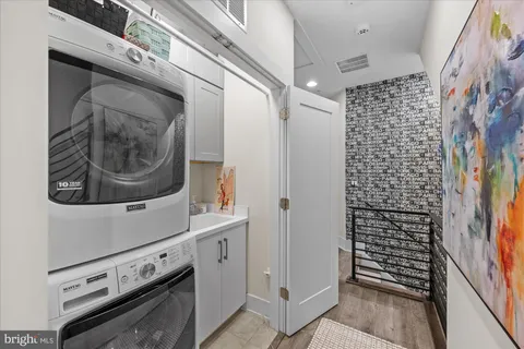 a bathroom with a sink a bath tub and a shower