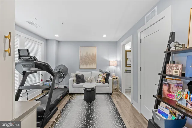 a view of entryway with wooden floor