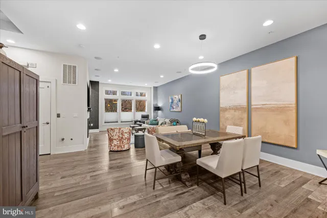 a living room with furniture fireplace and window