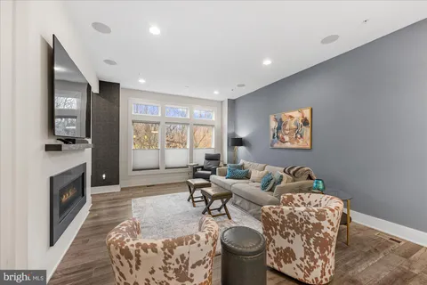 a kitchen with a table and chairs in it
