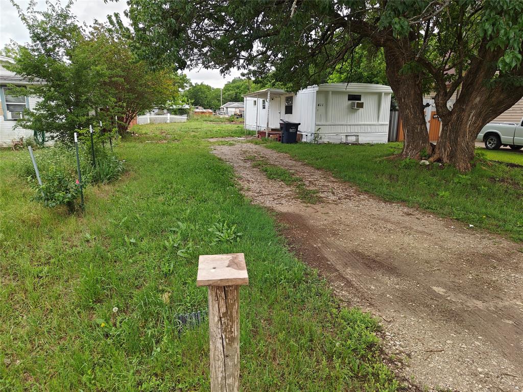 411 East Locust Street Whitewright, TX 75491 - Photo 1 of 7