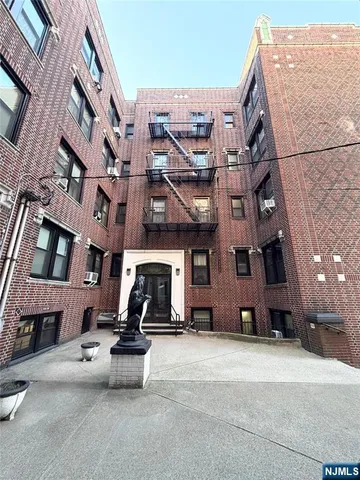 a view of a street with buildings