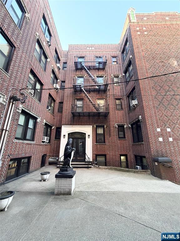 a view of a street with buildings