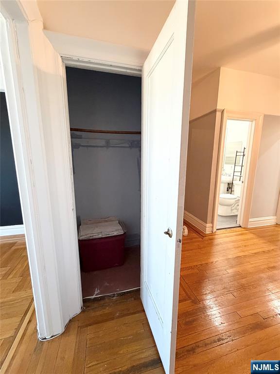 3718 Park Avenue, Unit D4 Weehawken, NJ 07086 - Photo 14 of 25 a view of walk in closet with wooden floor