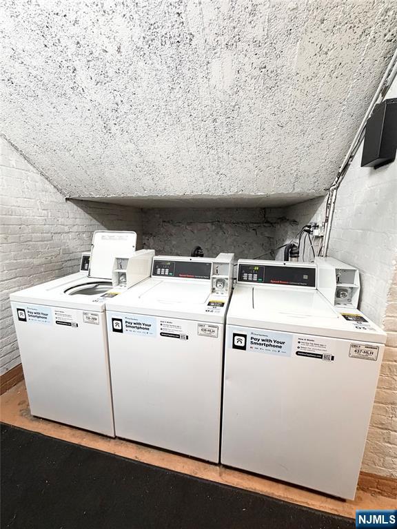 3718 Park Avenue, Unit D4 Weehawken, NJ 07086 - Photo 23 of 25 a utility room with dryer and washer