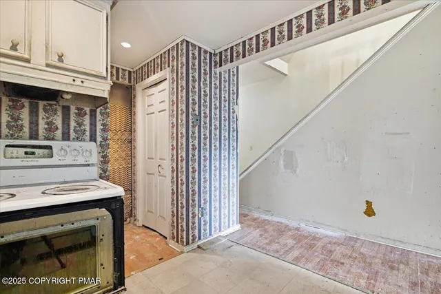 a view of an entryway with staircase