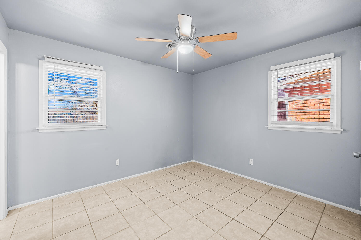 5522 17th Street Lubbock, TX 79416 - Photo 13 of 22 a view of an empty room with a window